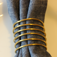 Table and Kitchen fair trade ethical sustainable fashion Brass Coil Napkin Rings- Set of Four conscious purchase Basha